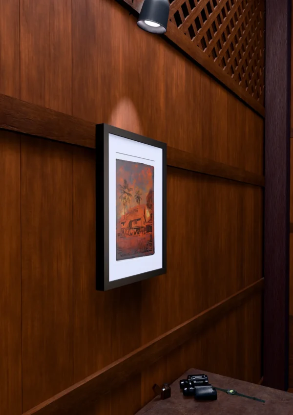 Frame 526 in Sunset - Wall Frame 526 in Sunset, gel plate monotype by Daniel Arendzen, framed on a wooden wall under a spotlight, seen from the side, with binoculars, a watch and a lighter on a table below. The room is a Blender render of the interior of the same traditional Malaysian house shown in the print.