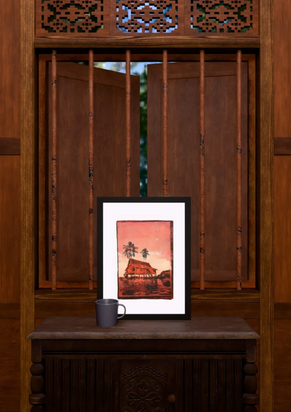 In Pink Sunset, gel plate monotype by Daniel Arendzen, framed and standing on a carved wooden cabinet under a barred window, with a mug for scale. The room is a Blender render of the interior of the same traditional Malaysian house shown in the print.