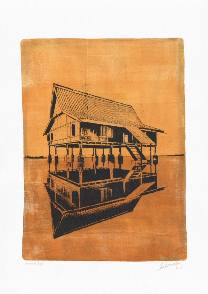 Rusty Water, gel plate monotype by Daniel Arendzen, shown in full including the paper and the pencil writing at the bottom. The impression shows a traditional Malaysian house on stilts in black, standing on its own reflection, with a thin horizon line, on warm rust orange, on textured cold-pressed paper