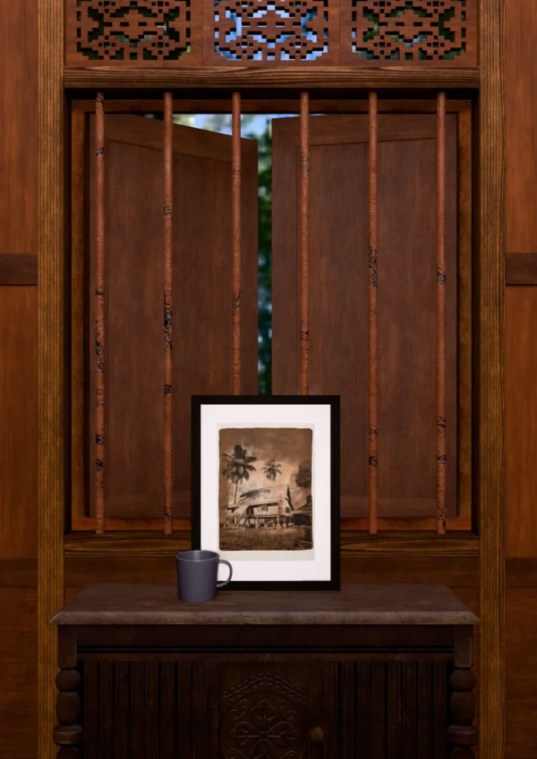 Vintage in Sepia, gel plate monotype by Daniel Arendzen, framed and standing on a carved wooden cabinet under a barred window, with a mug for scale. The room is a Blender render of the interior of the same traditional Malaysian house shown in the print.